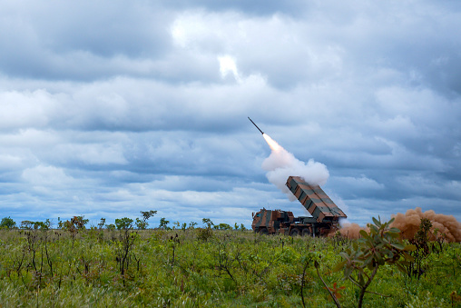 A missile launches from the rocket launch vehicle system.