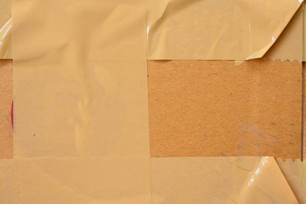 istock brown cardboard paper box, paper textured background 1443140383