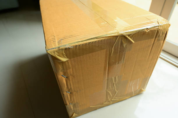 istock brown box packaging for shipping, paper textured 1443140543