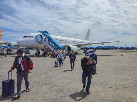 Jakarta-Indonesia, 21/11/2022: Passengers have arrived at Soekarno–Hatta International Airport, Jakarta, Indonesia.