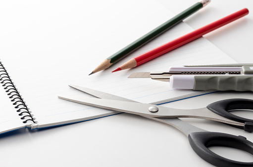 Image of stationery tools using scissors, pens, etc.