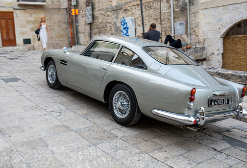 Matera, Italy – September 24, 2019: Aston Martin DB5 while filming chase scenes through the narrow streets of the movie 