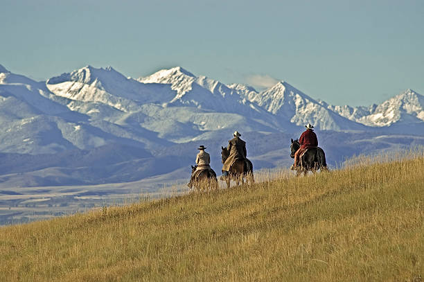 Cowboys riding the range in Montana.