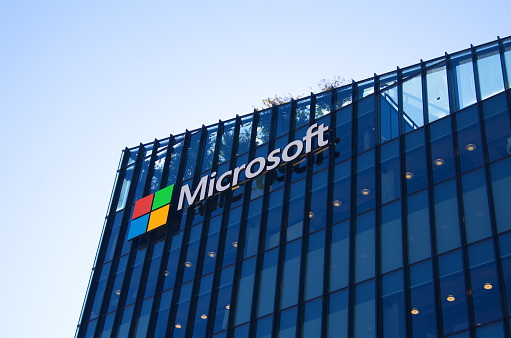 Israel Herzliya November 2022. Microsoft building. Modern hub made of glass and metal. Close-up company logo - capital letters . Entrance to the building.