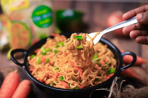 instant maggi noodles restaurant style served in a b