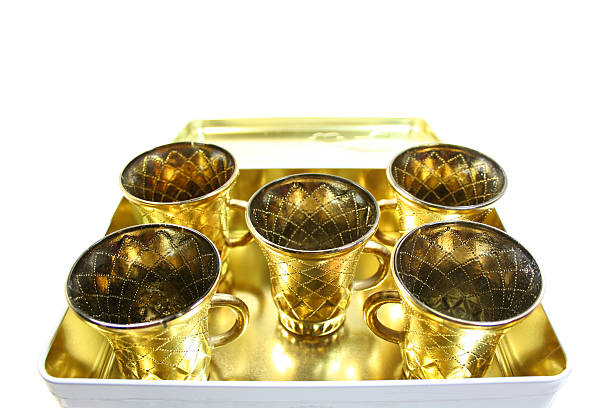 Five gilt cups stock photo