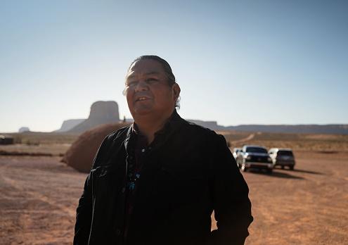 Senior navajo man portrait in Monument Valley desert