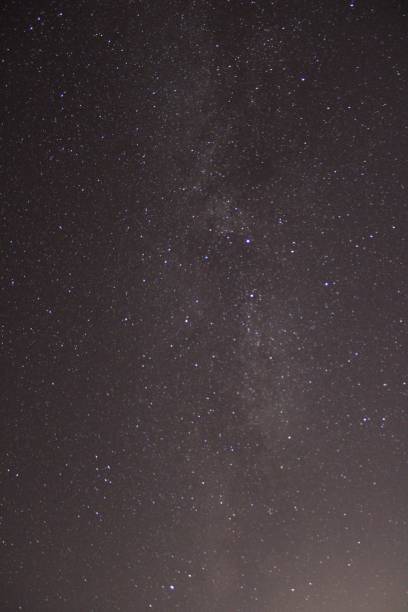 istock Beautiful vertical shot of the starry sky 1443177850