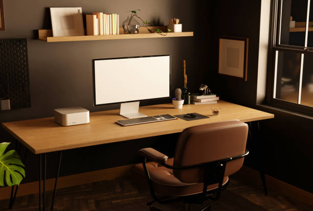 istock Modern stylish dark home office workspace with computer on wood table against the black wall 1443178889