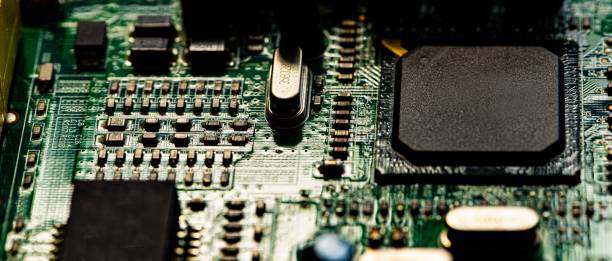 istock Macro Close up of components and microchips on PC circuit board 1443180172