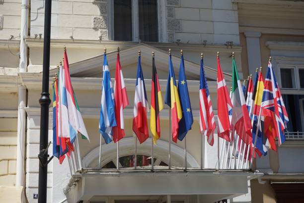 istock Flags of different countries on a building 1443181854