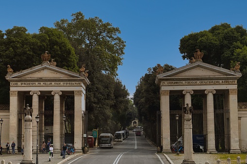 Rome, Italy – May 04, 2022: The gateway to Villa Borghese Gardens in Rome, Italy.