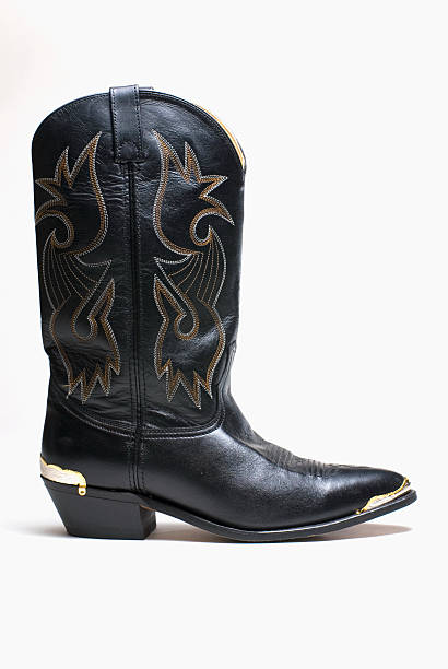 Western cowboy boot isolated on white background stock photo