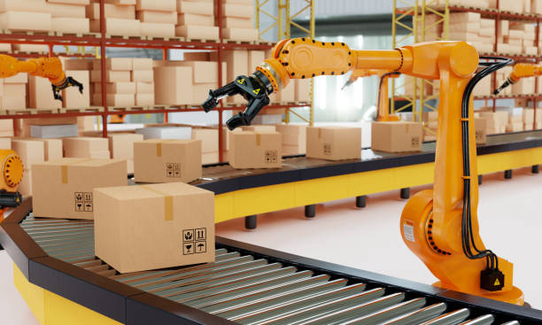 istock Industrial robot arm grabbing the cardboard box on roller conveyor rack with storage warehouse background. Technology and artificial intelligence innovation concept. 3D illustration rendering 1443185491