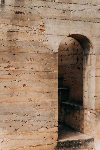 istock Vertical shot of a stone building with an arch 1443185633
