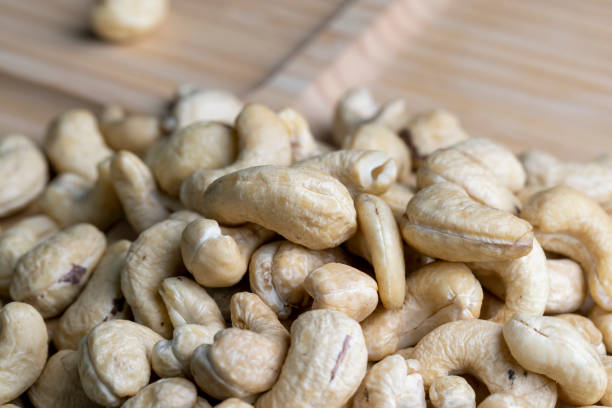 istock Fresh peeled cashew nuts on the table 1443187514