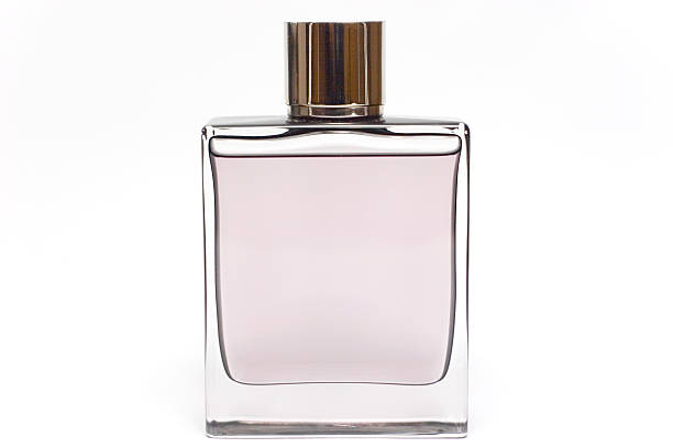 transparente botella de perfume aislado en blanco - perfume sprayer fotografías e imágenes de stock
