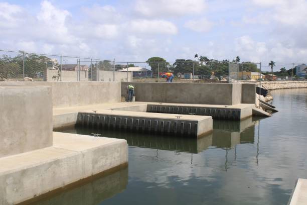 Constitution River in Bridgetown Barbados – July 06, 2022: Photo of completed Constitution River in Bridgetown Barbados concrete jetty stock pictures, royalty-free photos & images