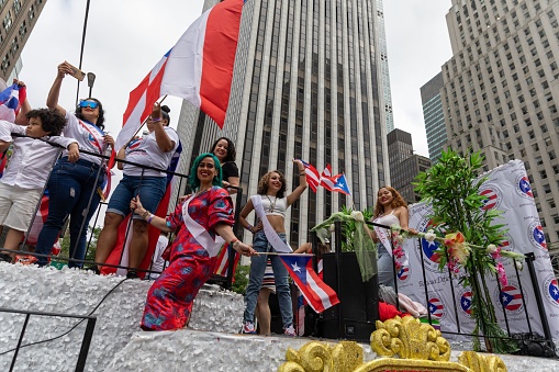 – June 13, 2022: The large crowd celebrating Puerto Rican Day Parade 2022 on the streets of New York City, USA