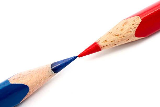 istock Red and blue opposite pencils 144319269