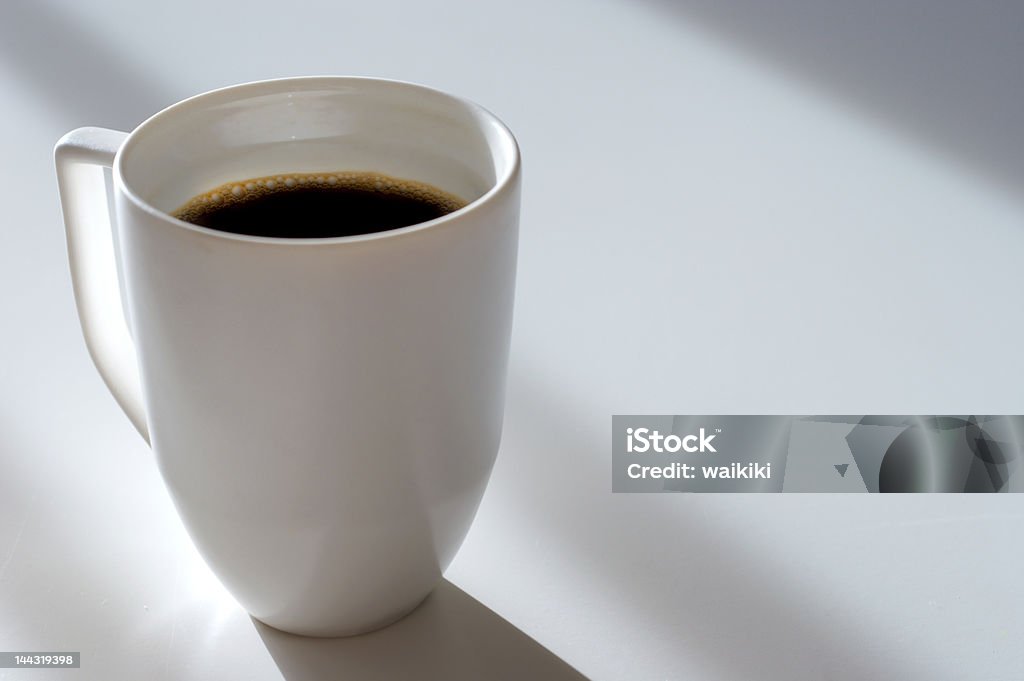 Coffee Cup IV The stuff that gets you going in the morning on a clutterless stage with some nice light and shadow effects. Loads of space for your copy. Check out different angles. Black Coffee Stock Photo