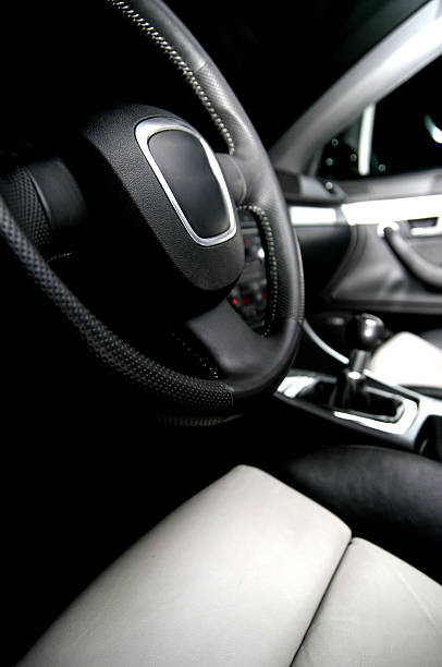 istock Driver view of black and white car interior 144319504