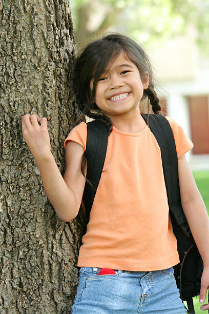 Six years old girl ready for first day of school Smiling Six years old girl ready for first day of school,excited and happy. report card stock pictures, royalty-free photos & images