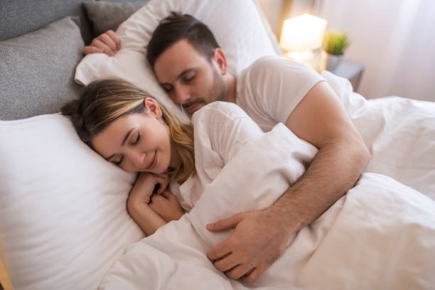 Couple in the bed stock photo