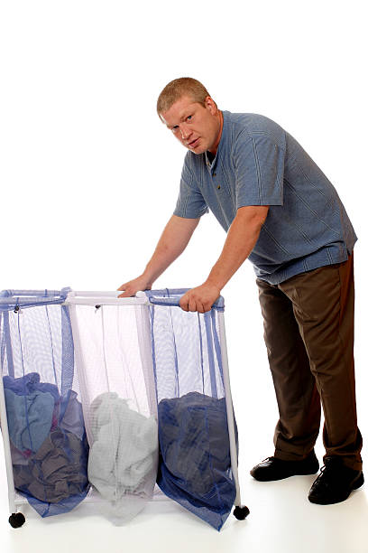 washday - laundry husband housework men stock-fotos und bilder