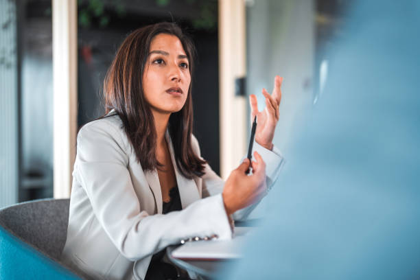 istock Assertive Asian Female with Short Hair At Work 1443199456