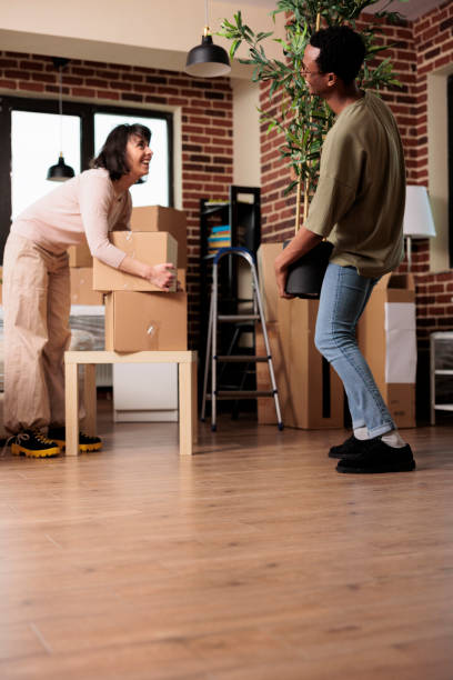 istock Diverse people buying first apartment and moving in together 1443202473