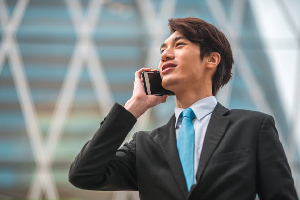 istock Man Making Business via a Phone Call in Asia 1443203298