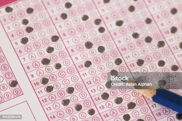 Answer Sheets With Pencil Drawing Fill To Select Choice Education Concept Stock Photo - Download Image Now