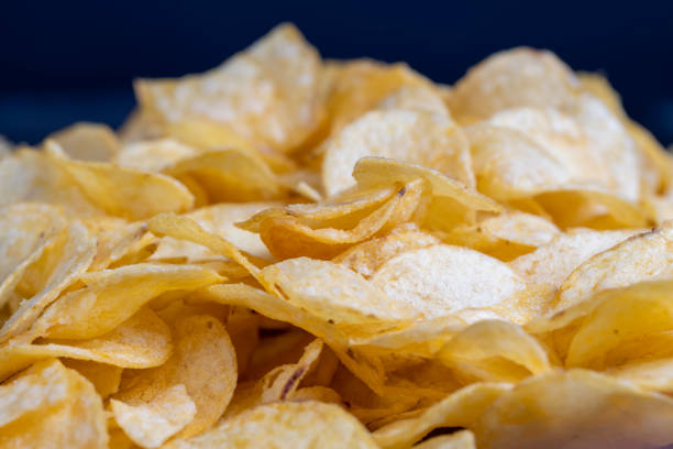 istock scattered potato chips with natural spices 1443205757