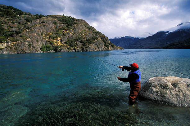 istock Fly fisherman Patagonia River 144320615
