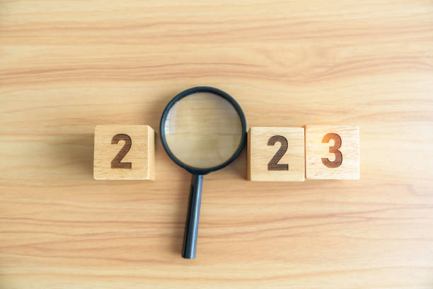 istock 2023 block with magnifying glass. SEO, Search Engine Optimization, hiring , Advertising, Idea, Strategy, marketing, Keyword, Content and New Year start concepts 1443206155