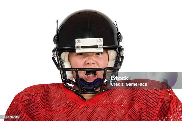 Young Boy In Football Gear Including Black Helmet Stock Photo - Download Image Now - Mouthguard, Child, American Football Player