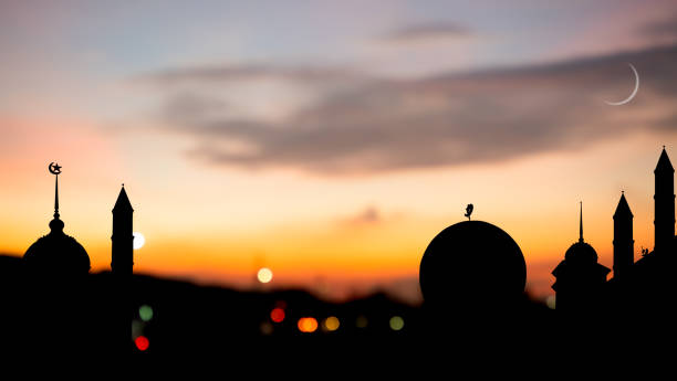 istock Mosques Dome on Dusk Sunset Twilight Sky and Bokeh Light Background 1443207112