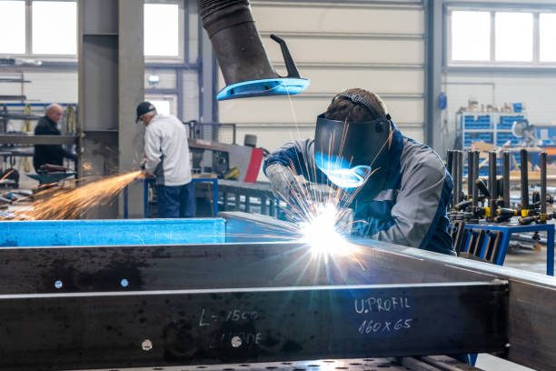 istock Welder working in factory 1443208309