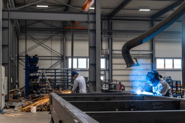 istock Welders working in factory 1443208312