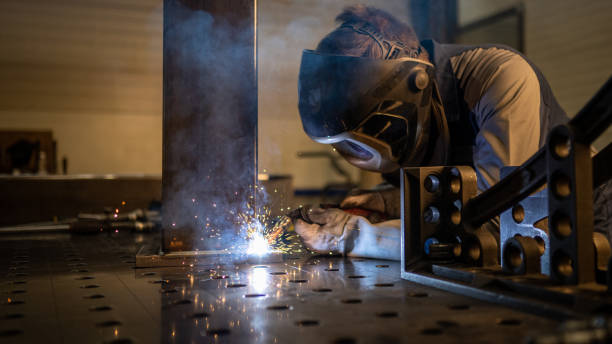 istock Welder working in factory 1443208314
