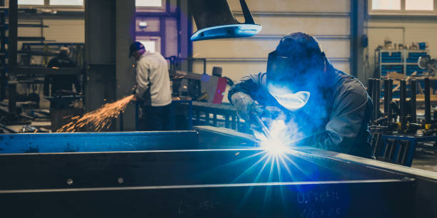 istock Welder working in factory 1443208319