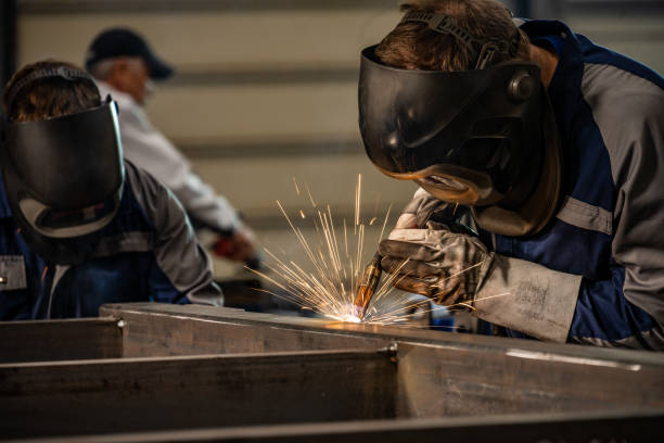 istock Welders working in factory 1443208355