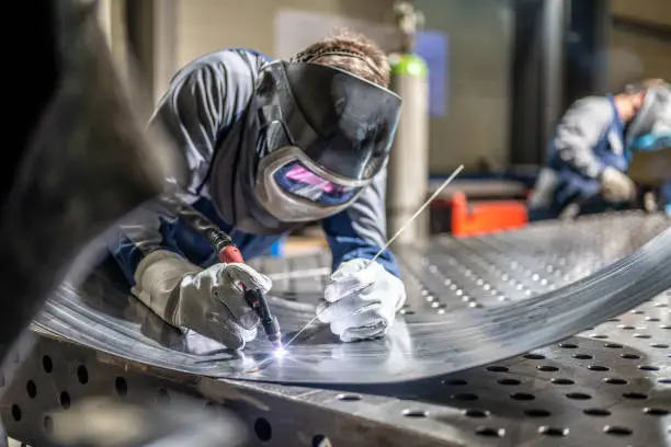 Photo of Welder welding sheet metal