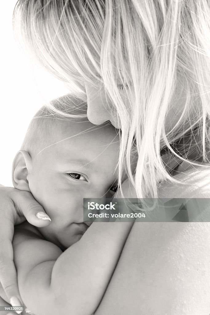 mother and son, isolated over white Baby - Human Age Stock Photo