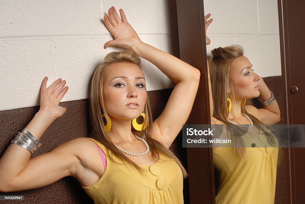 woman yellow dress blonde woman yellow dress with jewelry Adult Stock Photo