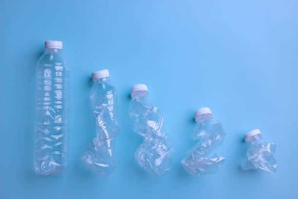 istock Five Plastic are squeeze for recycle. Ecology and ecosystem. Save world and trash management. 1443216671