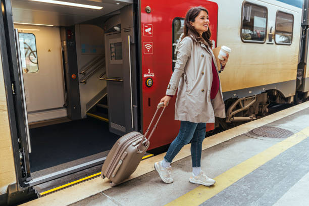 istock Businesswoman getting off the train 1443217217