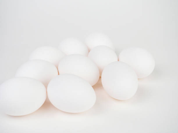 istock White eggs on a white background. Concept of the world crisis. Egg supply disruption, scarcity, poverty. 1443218621