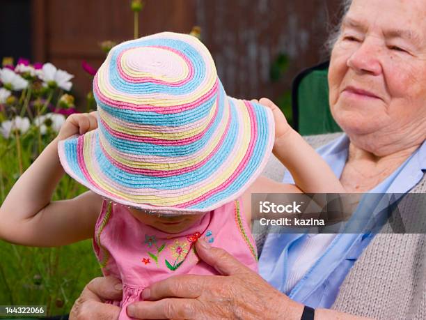 Wearing Rainbow Hat Stock Photo - Download Image Now - Active Seniors, Adult, Chair